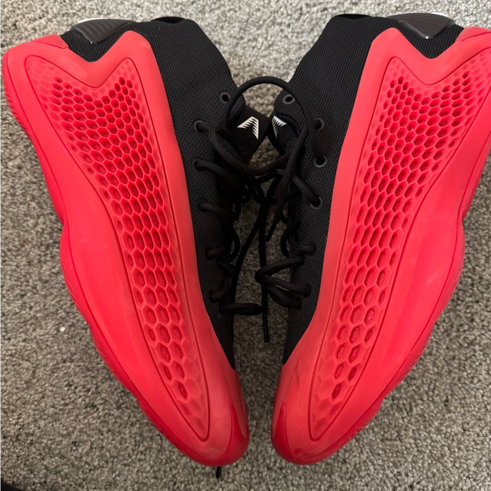 Anthony Edward’s basketball shoes (adidas Black and Red Athletic Shoes)
